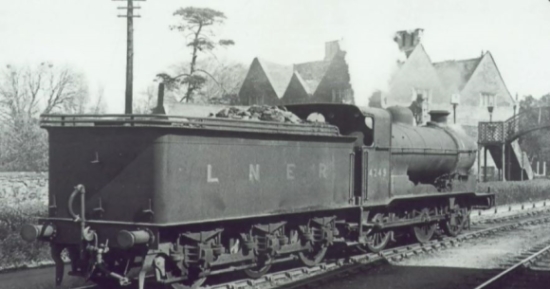 The former railway line in Bourne with the Red Hall (formerly the ticket office) in the background.